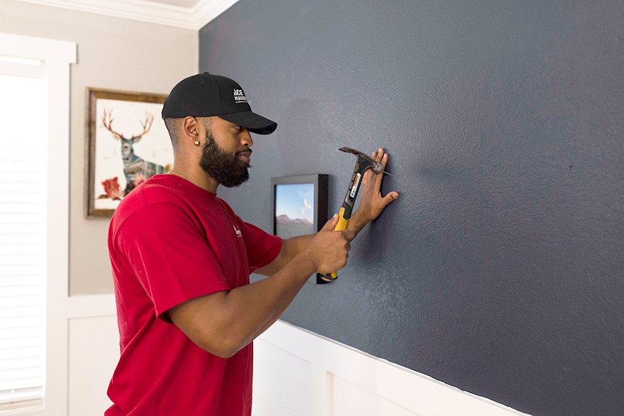 An AYGU HANDYMAN hanging picture frames
