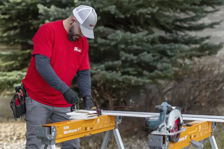 Carpenter cutting trim in Westerville, OH Carpenter cutting trim in Westerville, OH