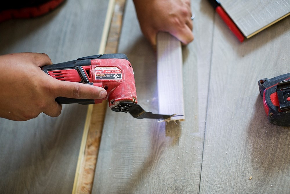 Handyman Installing Bedroom Flooring