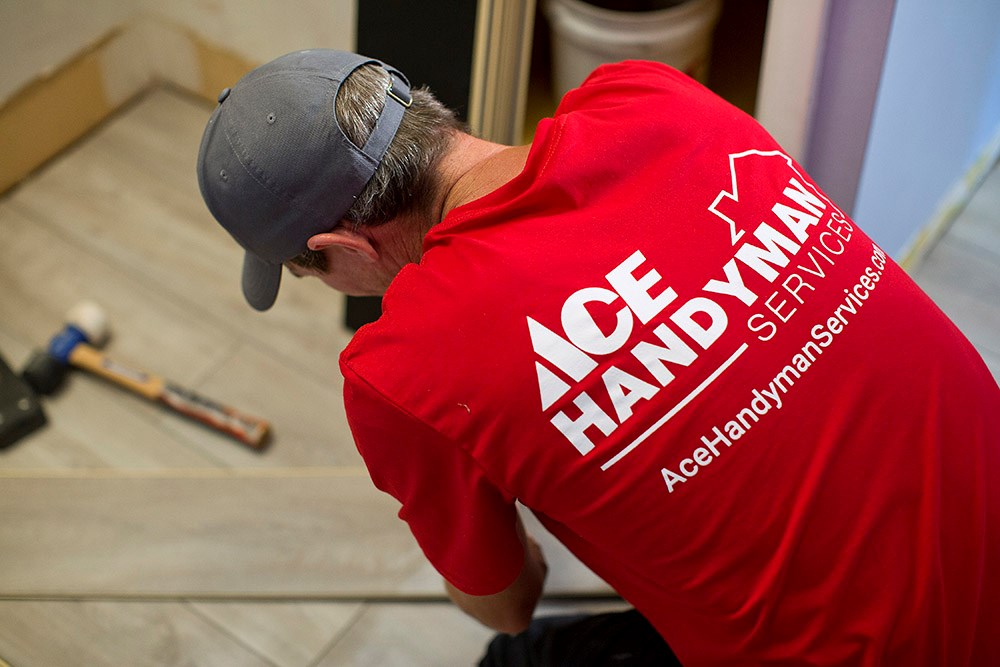 Ace Handyman Installing Living Room Flooring