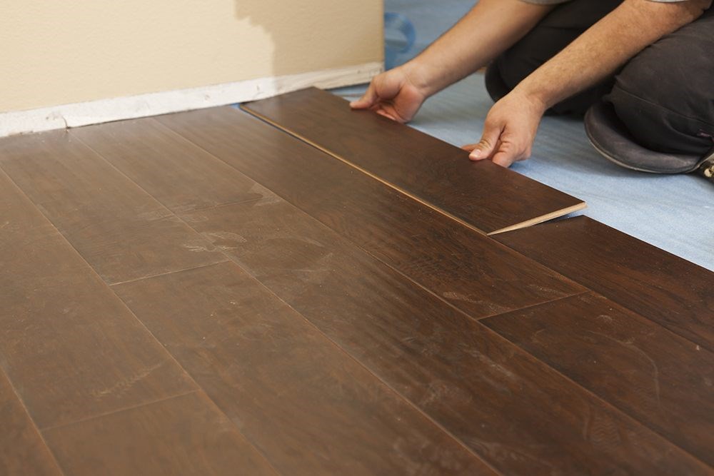 image of someone installing hardwood floors