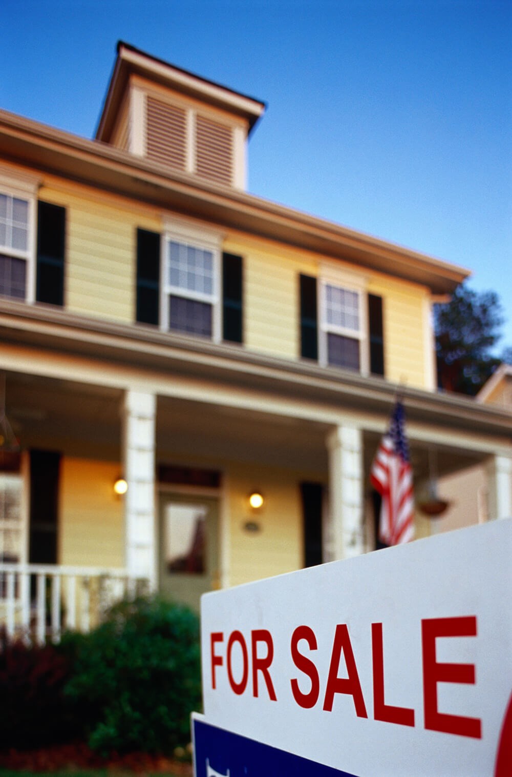 image of a house with a for sale sign