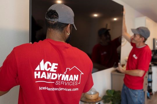 image of a people installing TV