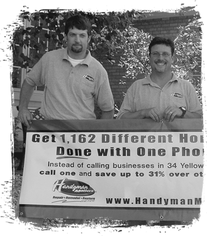 Image of two Ace Handyman holding up an ad banner Image of two Ace Handyman holding up an ad banner