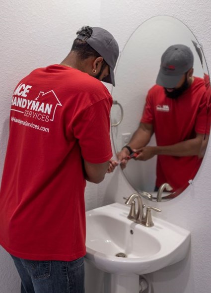 Handyman Installing mirror
