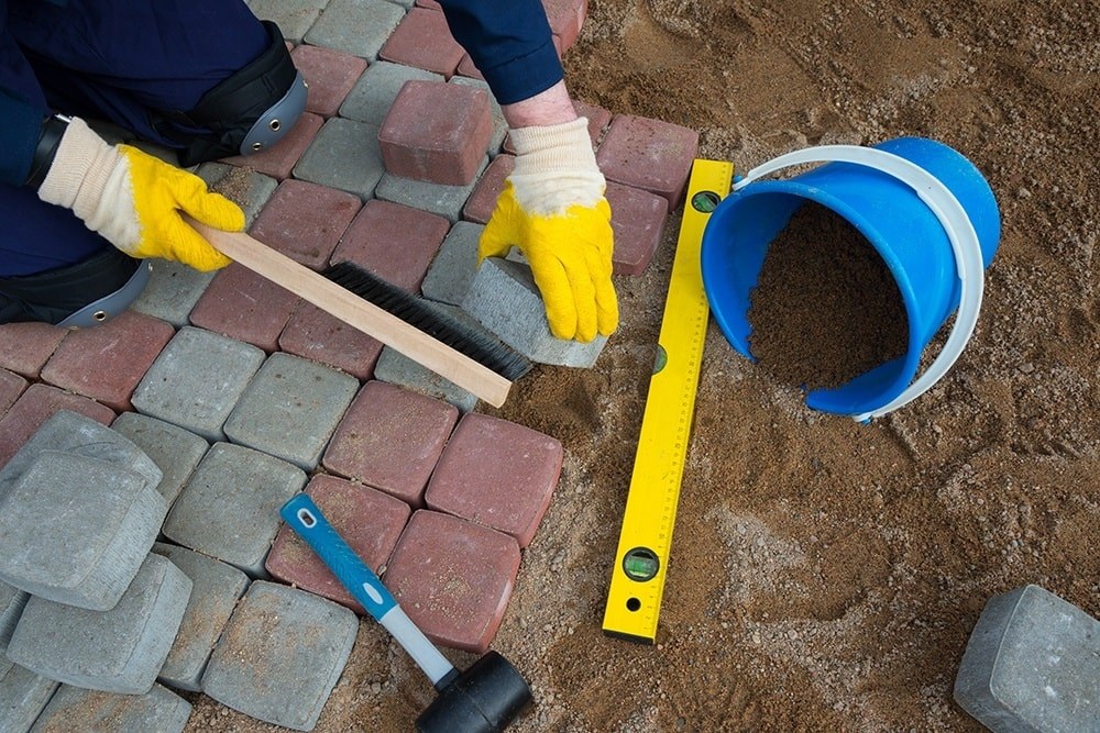 image of someone laying bricks