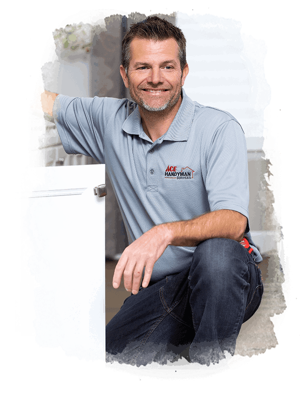 AYGU HANDYMAN working on a cabinet