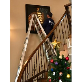 Hang Artwork Above Circular Stairway, The Woodlands, TX