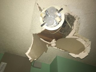 Before photo: customer stepped through the ceiling. Sheetrock repair