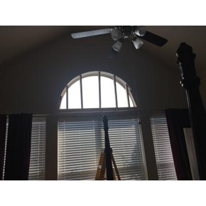 Before: Customer wants this arched window to disappear!