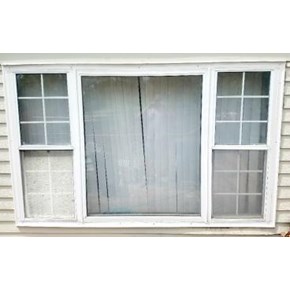 Before photo of exterior trim replaced around window in Littleton, CO