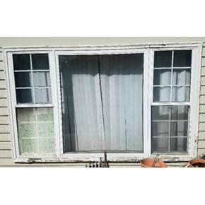 Before photo of exterior trim replaced around window in Littleton, CO