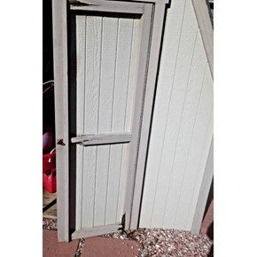 Damaged door on shed in Louviers CO 80131