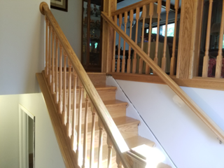 Eden Prairie townhome - new oak stair treads. risers and railings