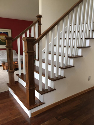Minnetonka - new hickory handrails, newel posts and treads with painted balusters and risers