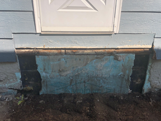 North Minneapolis - side entry porch - deteriorated cement stoop was removed