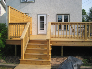 St. Paul Highland Park - new cedar deck with privacy wall - applied a clear oil based finish