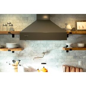 Tiled kitchen wall and vent hood