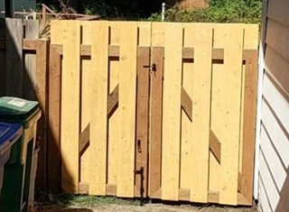 New wood gate installation in SE Portland after