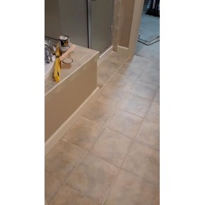 Bathroom tloor tile repair in NW Portland