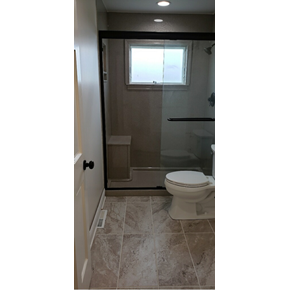 Bathroom Remodel in Galena, Ohio with Onyx Collection products and customer sitting bench