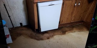 Water Damaged Floor in Port Crane, NY (before)