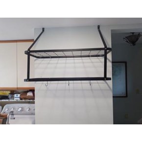 A new pot and pan rack installed in a kitchen condo on St. Helena Island