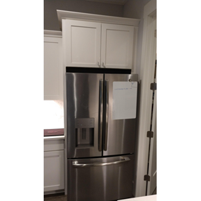 Cabinet cut to make room for a taller refrigerator in Bluffton