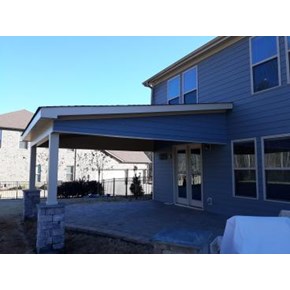 Final Deck in Bells Crossing stone and siding match to house