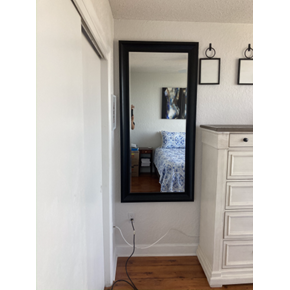 Mirror and Frames hung up in the DTSP Condo