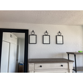 Mirror and Frames hung up in the DTSP Condo