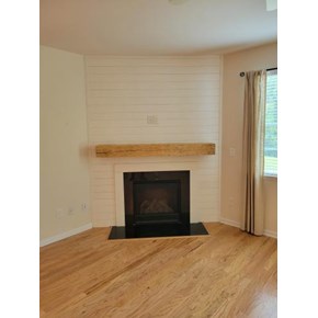 Shiplap wall with hand hewn barn beam Mantle (antique) 
