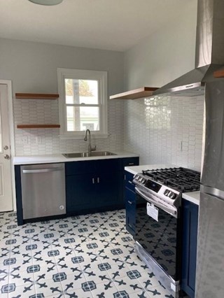 After Photo of ace Handyman Services Wilkes-Barre and Scranton Kitchen Remodel with New Cabinets, Flooring, Backsplash, Sink, Faucet and Appliances in Kingston, PA