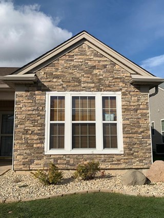 Ace Handyman Services Fox Valley  After - Front Elevation Update Using Silvermine Stone Siding