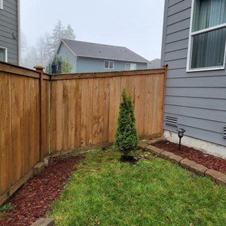 After Wind damaged fence repair