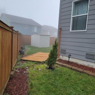 Before Wind damaged fence repair