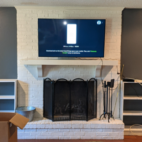 Mounted TV on a Brick Fireplace