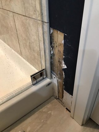 Before: bathroom drywall repair