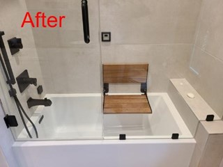 After the craftsman added the shower seat for safety
