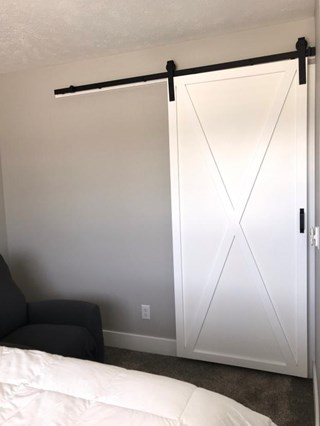 After: Barn door install in East Grand Rapids