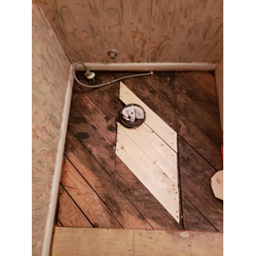 Bathroom Flooring Repairs (before)
