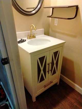 Installed New Bathroom Barn Style Vanity in Central Houston