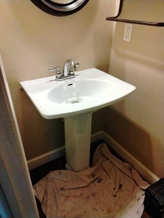 Remove old Pedestal Vanity in Central Houston