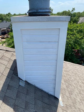 After: Chimney siding replacement