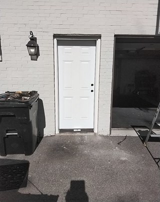 Exterior Garage Entry Door Replacement Before