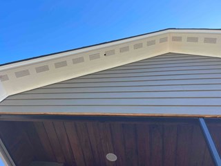 Holes in Soffit Before