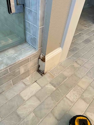 Ace Handyman Services baseboard repair in Costa Mesa, CA, before photo