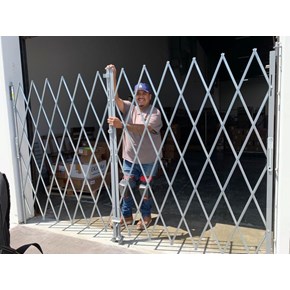 Security folding gate install in Cypress, CA