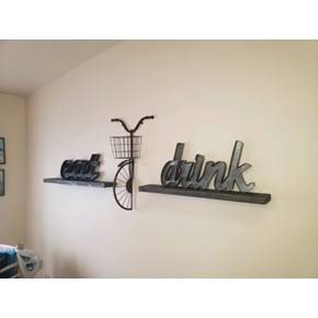 Art on top of shelves hung by craftsmen, bicycle art installation mounted by Ace handyman in McKinleyville