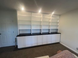 Custom Bookcase With Recessed Lighting Installation